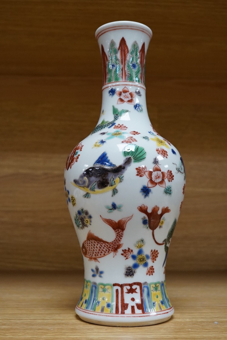 A Chinese wucai ‘fish and flower’ vase, 26cm